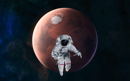 Astronaut on background of Mars. Solar system. Science fiction.