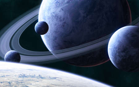 Blue planet with a system of rings and satellites in deep space. Science fiction.