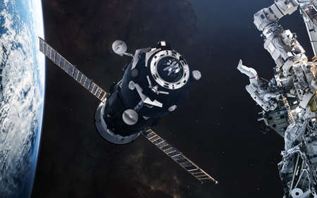 stations in orbit of planet Earth. Solar system. Science fiction. Elements of this image furnished...
