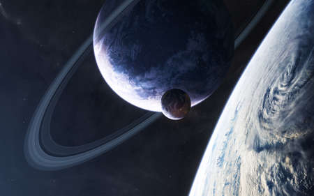 Planets in blue light somewhere in deep . Science fiction. Elements of this image furnished by