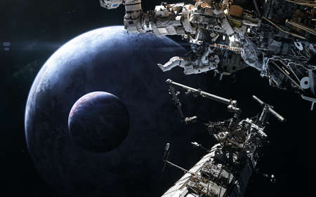 Space stations, astronaut on the background of planets in deep space. Science fiction.の写真素材