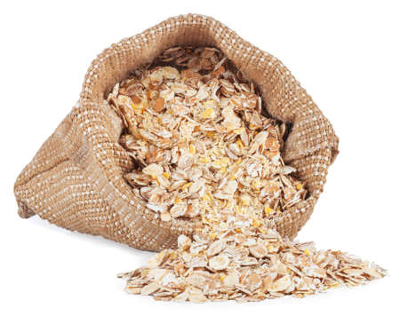 Oat flake isolated on white backgroundの写真素材