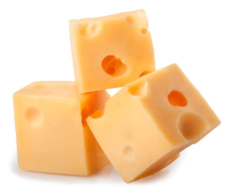 three cubes of cheese with big holes isolated on white backgroundの写真素材