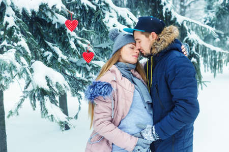 young future parents in winterの写真素材