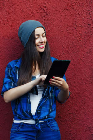 hipster girl with tabletの写真素材