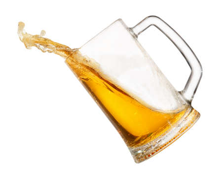 splashing beer in mug isolated on white background. Beer splashの写真素材