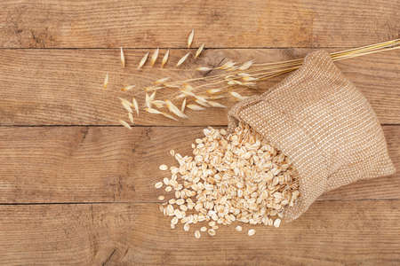 oatmeal in bag on tableの写真素材