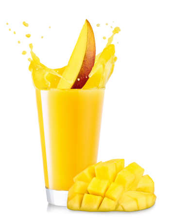 glass of splashing mango juiceの写真素材