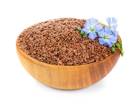 flax seeds and flowers in bowlの写真素材