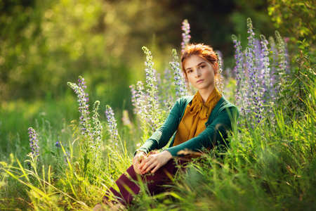 outdoors portrait of beautiful young womanの写真素材