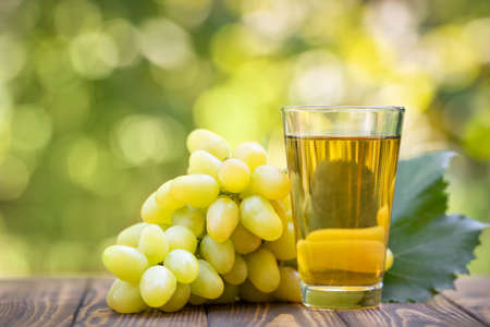 grape juice in glassの写真素材