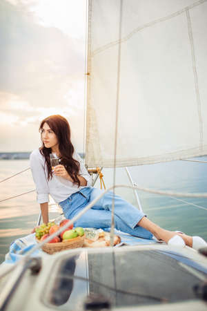 woman with glass of champagneの写真素材