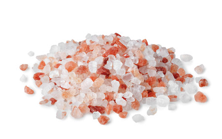 Heap of pink Himalayan salt isolated on white backgroundの写真素材