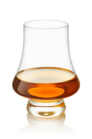 Glass of scotch whiskey or bourbon on white background with clipping pathの写真素材