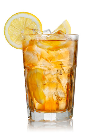 misted glass of ice tea with lemon isolated on white backgroundの写真素材