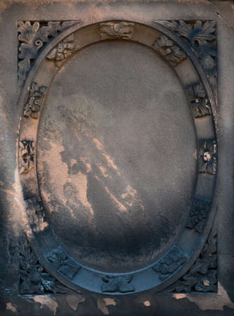 Aged Victorian gravestone frame with a gothic grunge lookの写真素材
