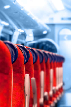 Empty Train Seats in a row - Light blue background