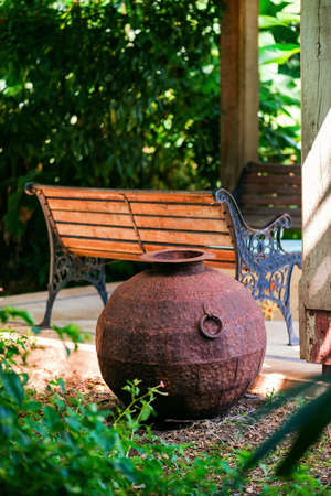 Decorative iron metal pot by gazebo relaxing space environment garden zen designの写真素材