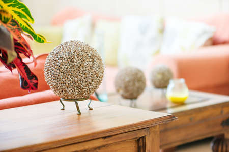 Modern home interior living room detail seashell balls on table top craft item objectの写真素材