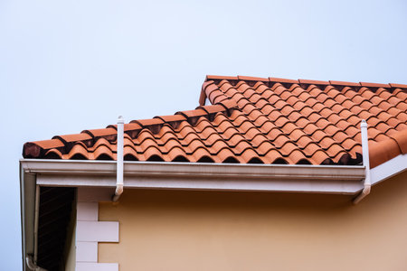Roof  terracotta clay tiles house red  tiled rooftop and guttering home architecture