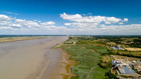 Aerial view of a wind turbine along the Loire river