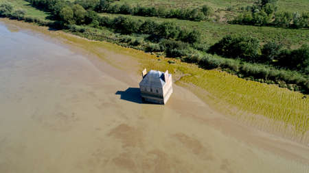 Aerial view photo of the house flooded in the Loire river, Coueronの写真素材