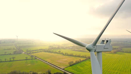 Aerial photo of wind turbines at sunset in Sainte Pazanneの写真素材