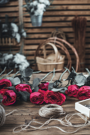 Red rose in brides flower bouquet fow wedding made by floristの写真素材