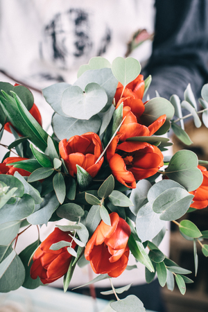 Florist shop with workplace on making flower bouquetの写真素材