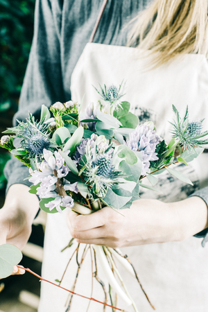 Small business concept with florist woman ownership on modern flower shopの写真素材