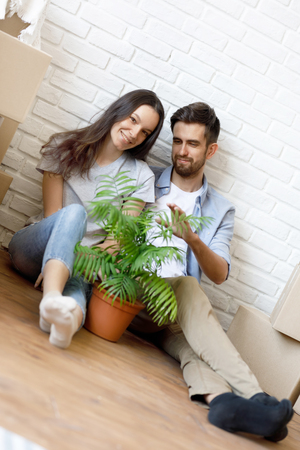 Casual family in new houseの写真素材