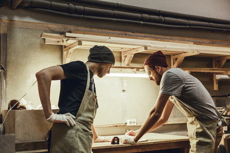Professional carpenters making draftの写真素材