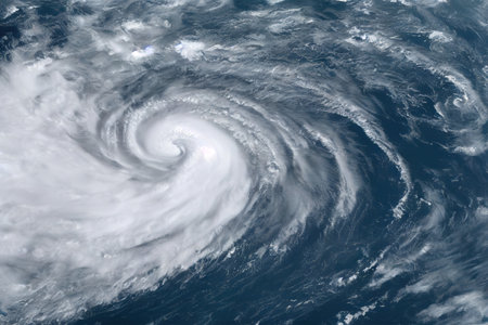 Powerful typhoon superstorm and tropical storm cyclone formation over ocean. Weather forecast, meteorology and natural disaster background. Climate change and global warmingの素材