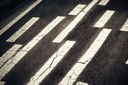 Asphalt road texture with lines grunge abstract background seamless pattern. Rough artistic striped urban highway or pavement surface wallpaperの素材