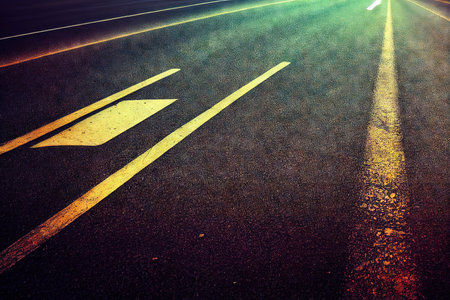 Asphalt highway with road traffic markings background. Journey of dream, trip route wallpaper with safety path surface seamless patternの素材
