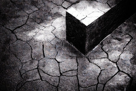 Dark cracks on the black grunge concrete surface background with abstract geometric shape of shadow. Damage wall or road texture with traces of destruction from old age and long time use.の素材