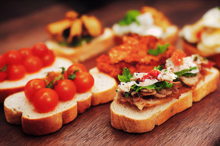 Vegetable and meat bruschetta on wooden table Italian kitchenの素材