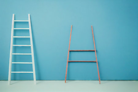 Step ladder against wall after renovation in bright blue tonesの素材