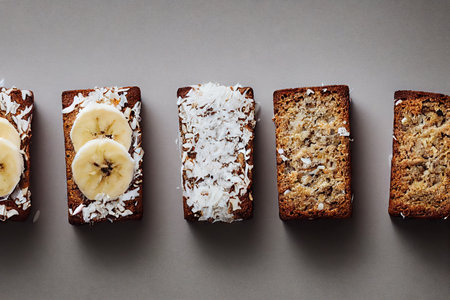 Rectangular bars of delicious homemade banana cake with white sprinklingの素材