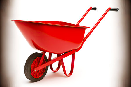 Red metal work wheelbarrow insulated on white backgroundの素材