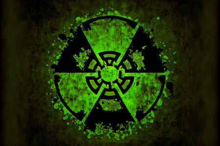 Luminous green with black symbol denoting radiation hazardの素材
