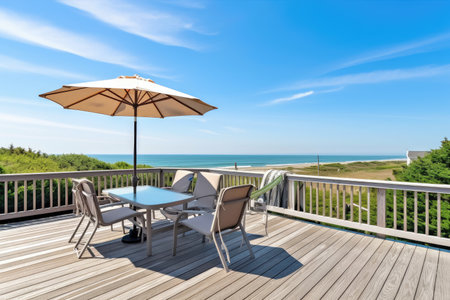cape cod house with deck and ocean view, perfect for summer getaway, created with generative aiの素材