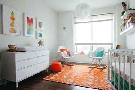 modern baby room, with sleek white furniture and pops of color, created with generative aiの素材