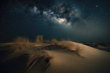 sand dunes with starry night sky and stars visible in the background, created with generative aiの素材
