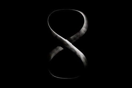infinity loop, symbol of endlessness and change, on black background, created with generative aiの素材