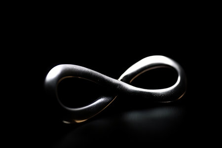infinity symbol on black background, making a strong and stylish statement, created with generative aiの素材