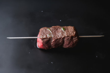 skewer of sizzling wagyu steak, ready to be cooked, created with generative aiの素材
