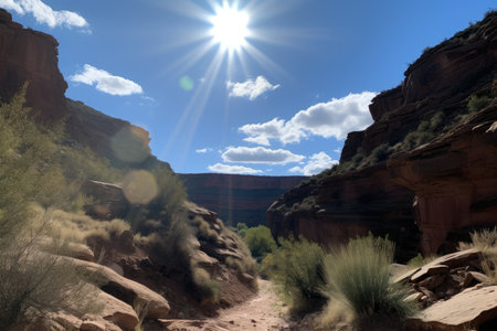 canyon with clear blue sky and clouds above, and the sun shining down, created with generative aiの素材