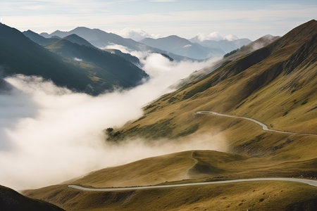 stunning mountain range with a ribbon of road winding through, surrounded by clouds and mist, created with generative aiの素材