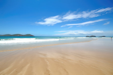 a beautiful beach with soft blue skies, created with generative aiの素材